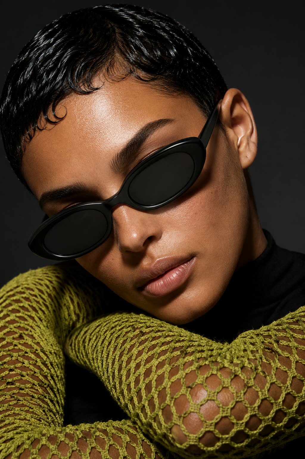 The sunglasses worn, a close portrait crop